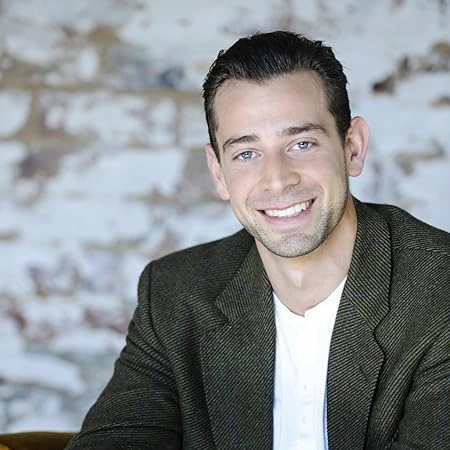 gillan gork smiling studio portrait