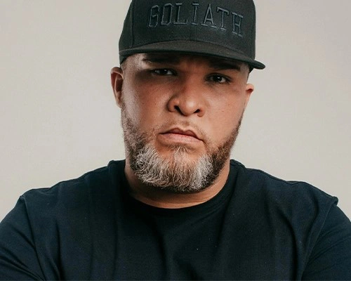jason goliath black cap portrait