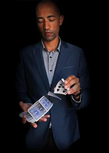 Magician card trick spade reveal portrait