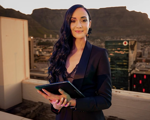 Mishka presenter portrait city skyline tablet