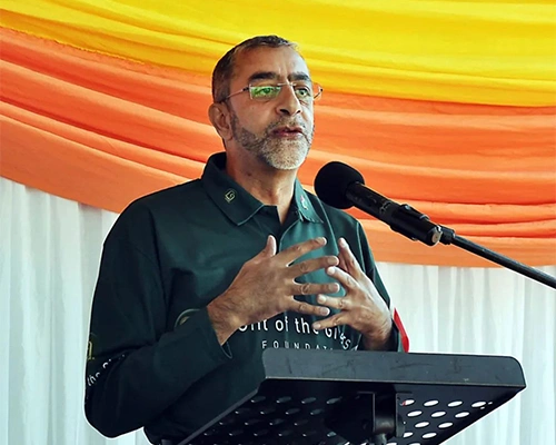 Dr Sooliman speaking at podium