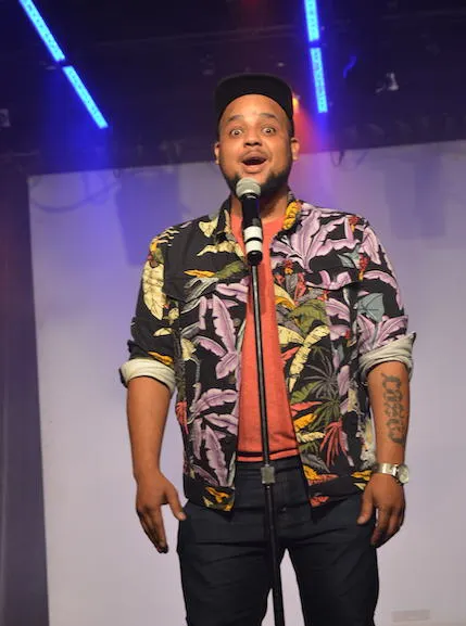 Shanray van Wyk comedian performing on stage